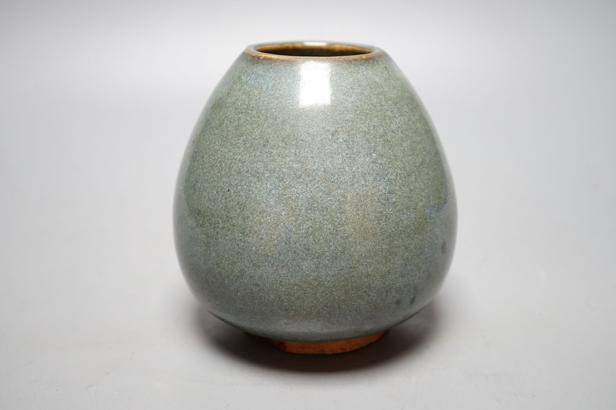 A Chinese jun-type type bud vase, Qing or earlier, 14 cms high.
